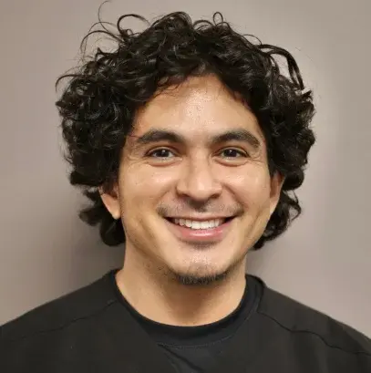 Dr. Efrain Vargas, dentist at Decatur dental practice, smiling portrait.