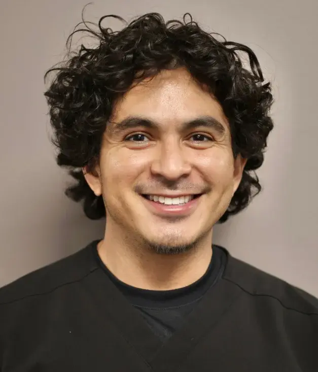 Dr. Efrain Vargas, dentist at Decatur dental practice, smiling at camera.